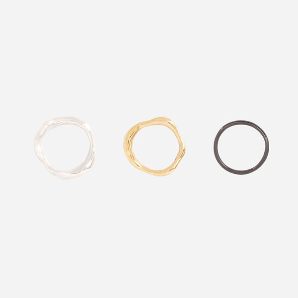 Tinicoterie Stream of Consciousness Ring Set in top view - includes Aella Ring in silver, Bria Ring in gold, Ember Ring in black